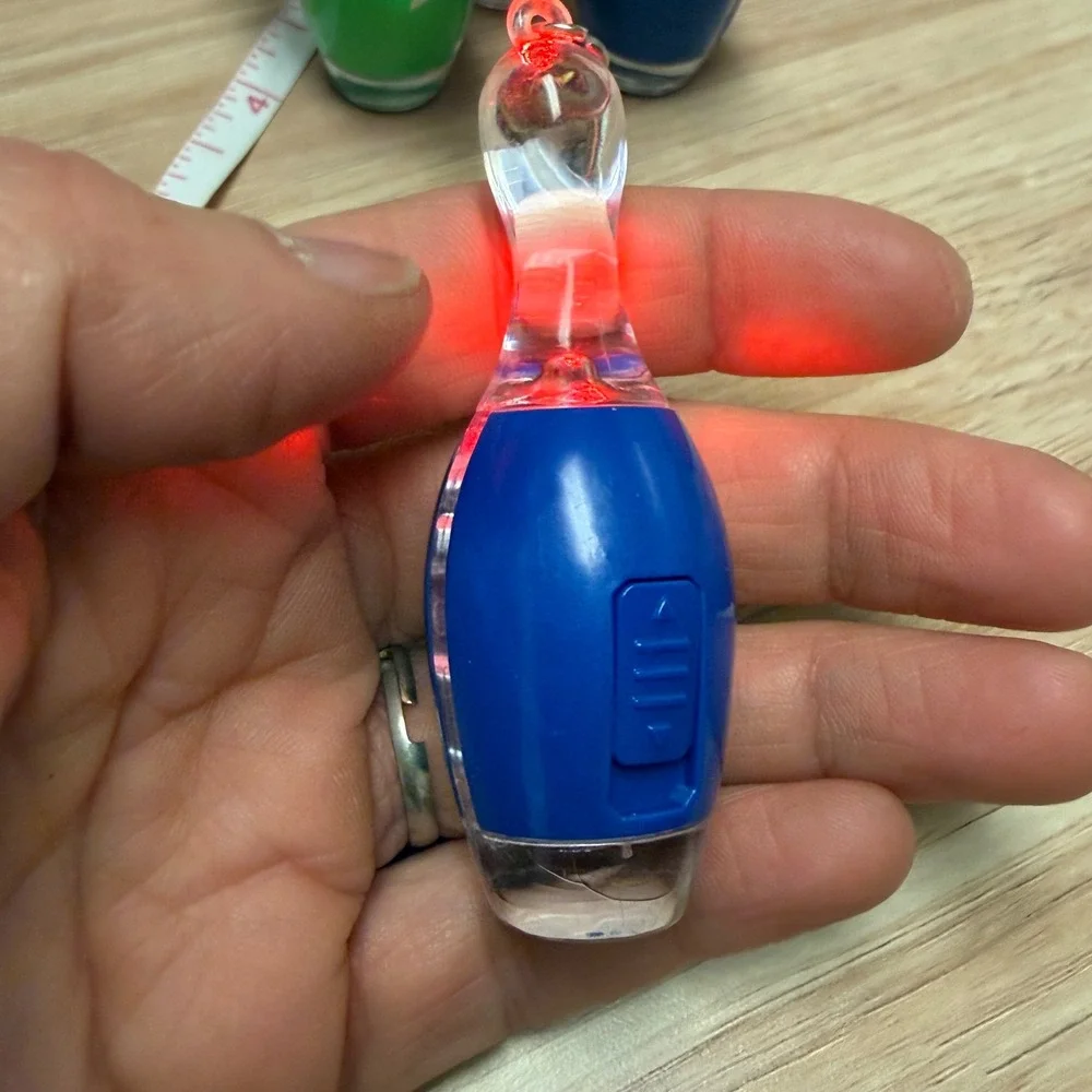 Set of 4 Bowling Pin Light Up LED Keychains Blue Green Orange Novelty